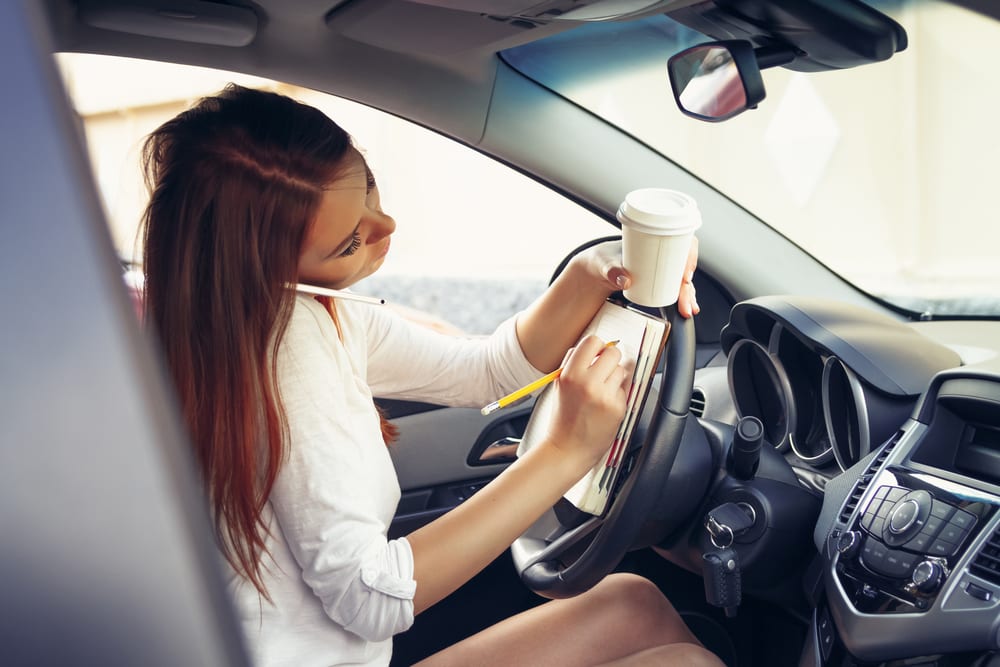 Woman Driving while Distracted