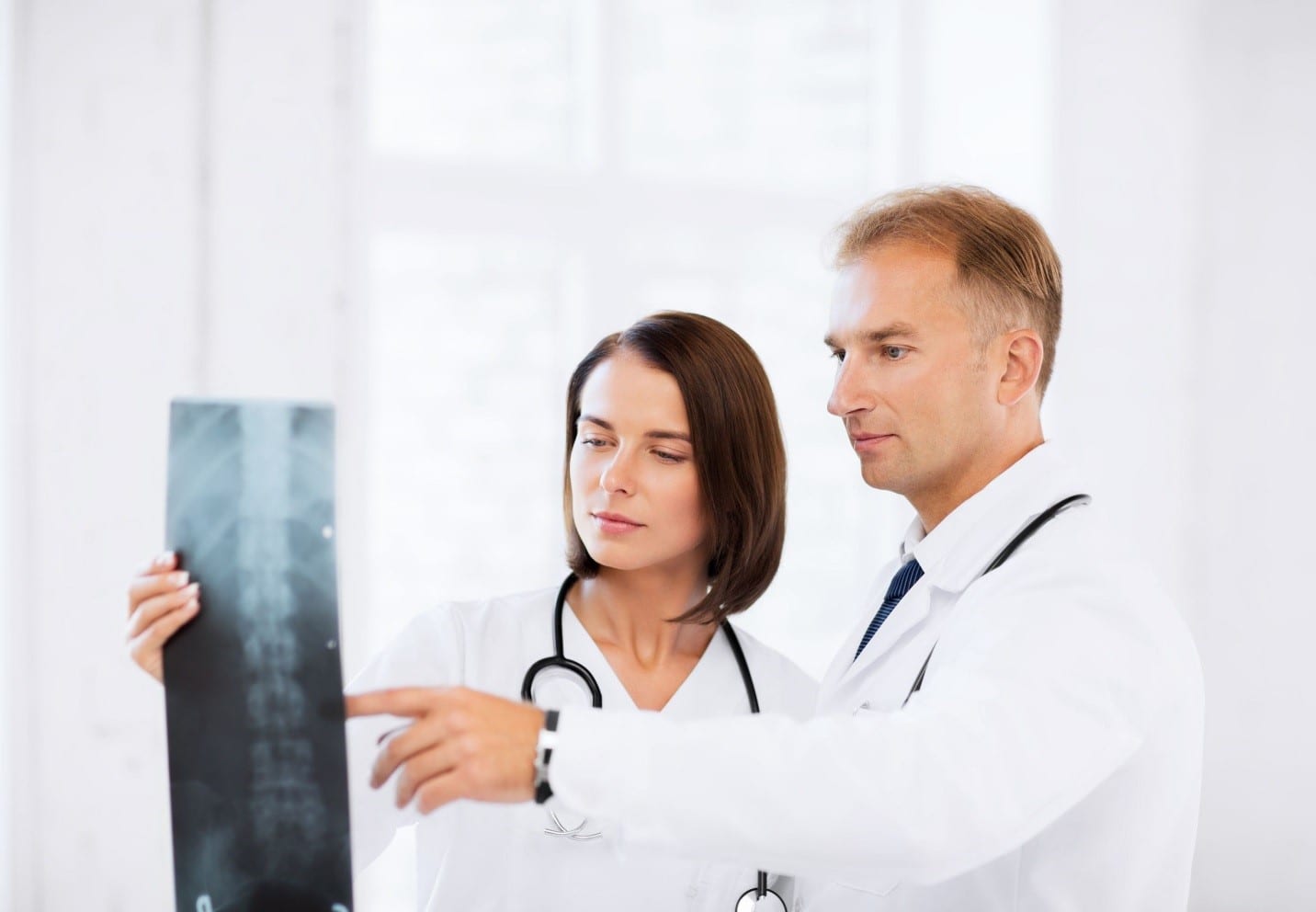 Doctor examining Spinal Cord Issues